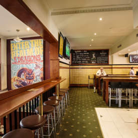 Unwind at the bar area in the Kirribilli Hotel